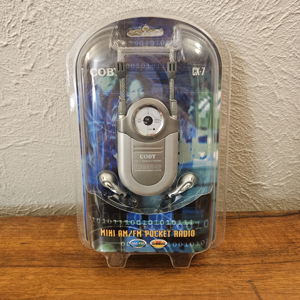 Coby Mini AM/FM DBBS CX-7 Pocket Radio With Earphones & Neck Strap New